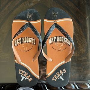 University of Texas flip flops. 
12” from toe to heel. Never worn